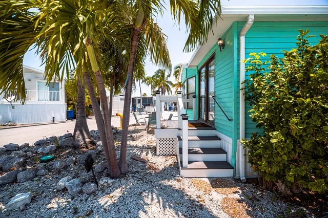 a view of a chairs setting on the deck