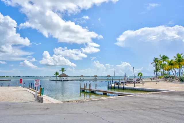 a view of a swimming pool and a chair