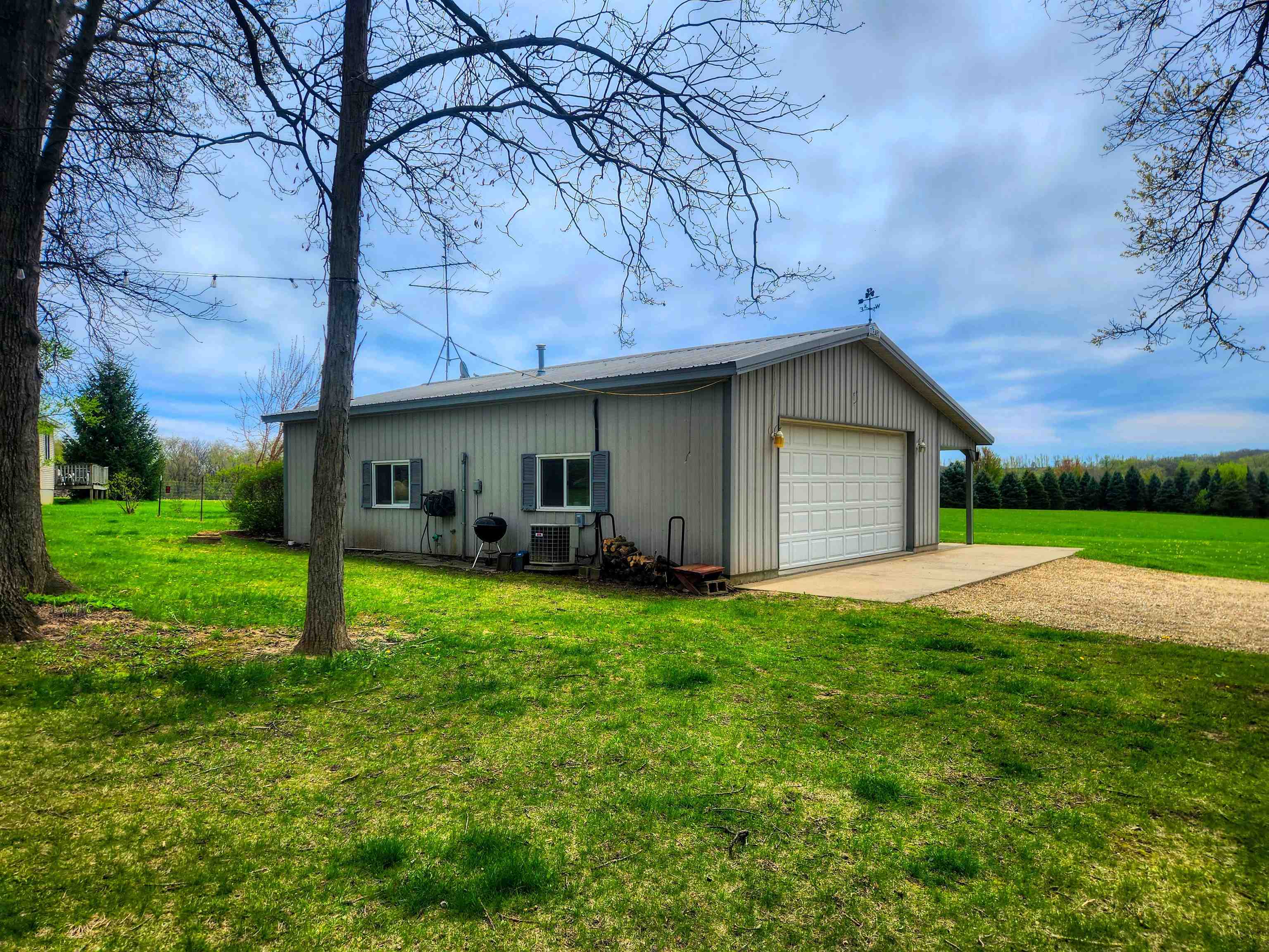 24344 Payne Road Shannon, IL 61078 - Photo 29 of 50 a backyard of a house with lots of green space