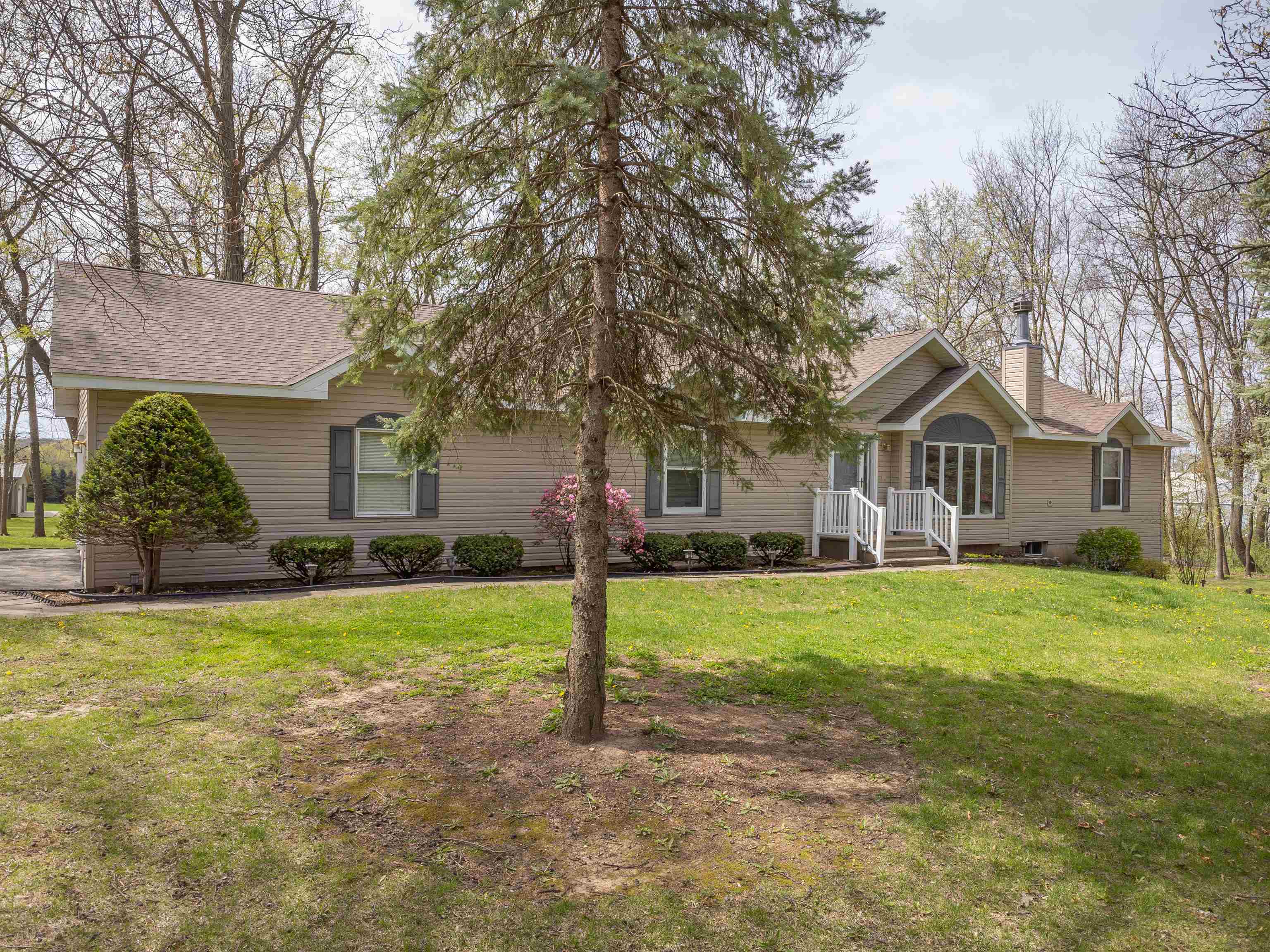 24344 Payne Road Shannon, IL 61078 - Photo 50 of 50 a front view of a house with a yard and garage