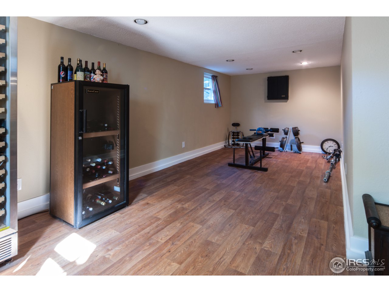 6184 Old Brompton Road Boulder, CO 80301 - Photo 31 of 36 a view of livingroom with furniture and wooden floor