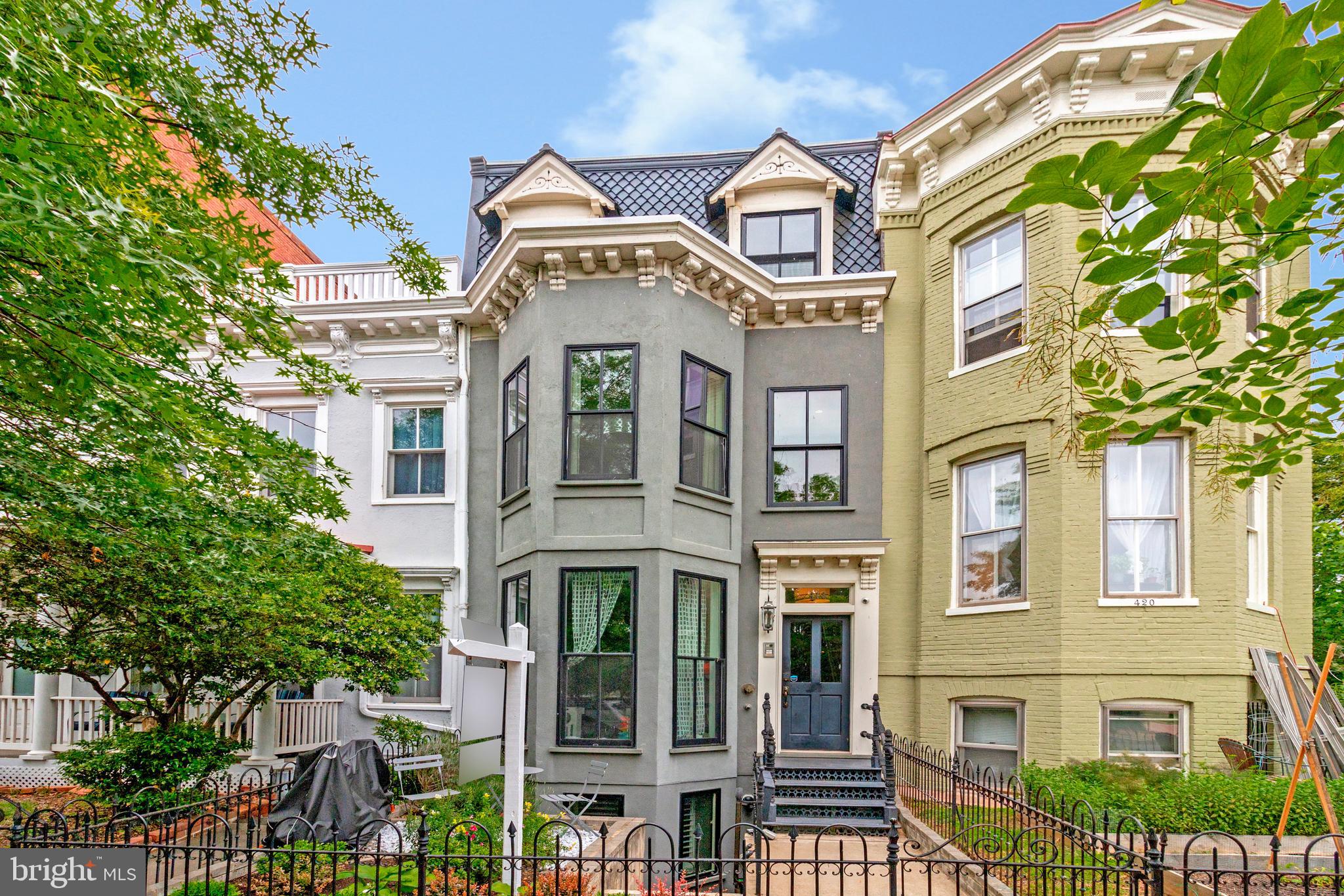 a front view of a multi story residential apartment building