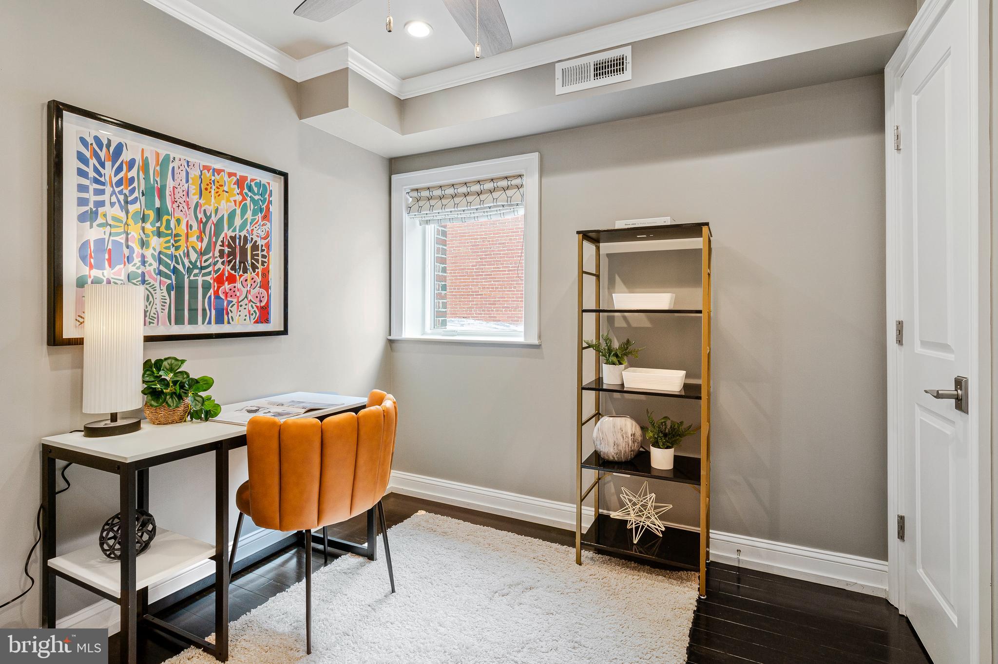 418 Seward Square Southeast, Unit 3 Washington, DC 20003 - Photo 12 of 16 a room with furniture and a window