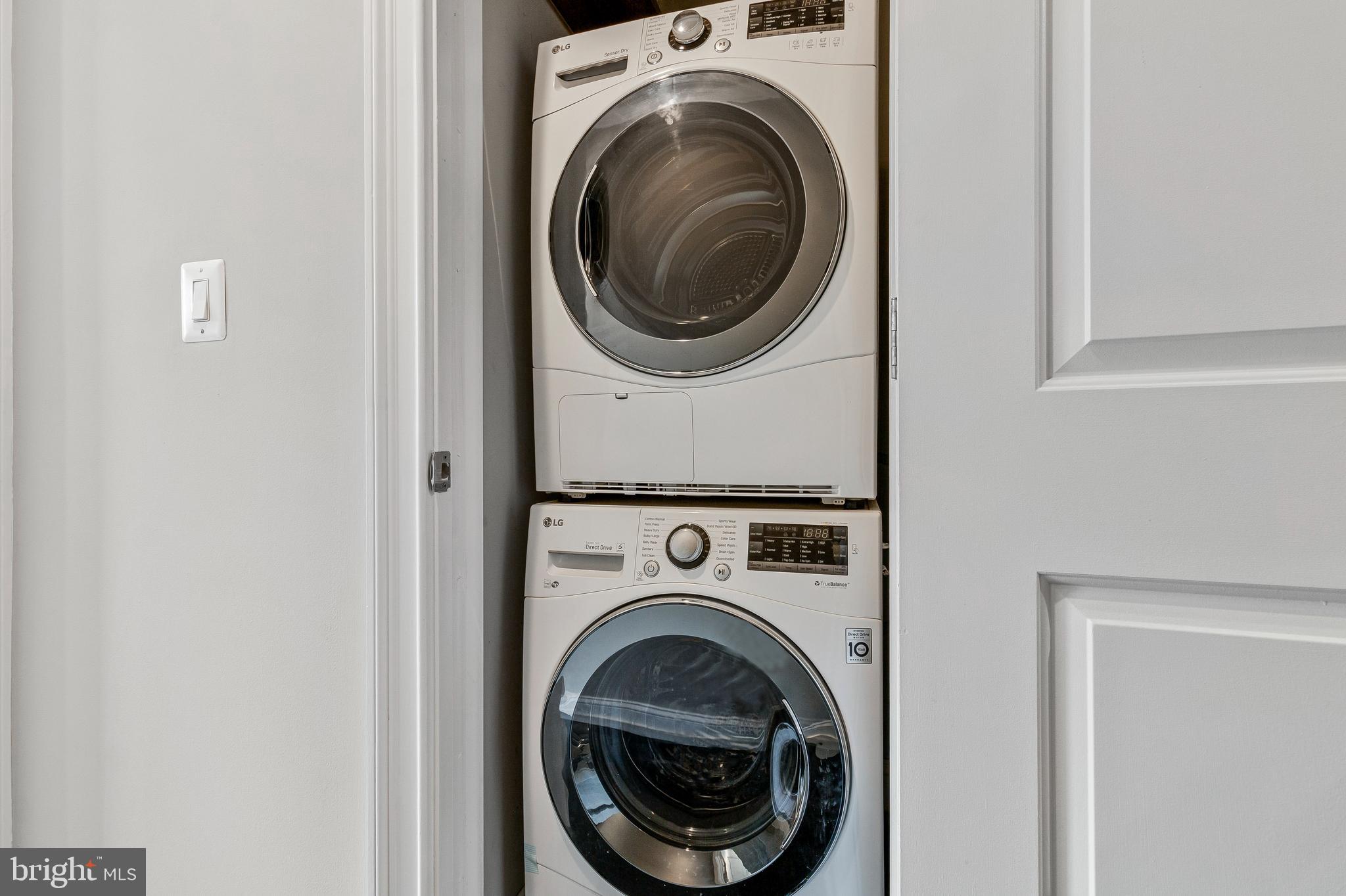 418 Seward Square Southeast, Unit 3 Washington, DC 20003 - Photo 14 of 16 a utility room with dryer and washer