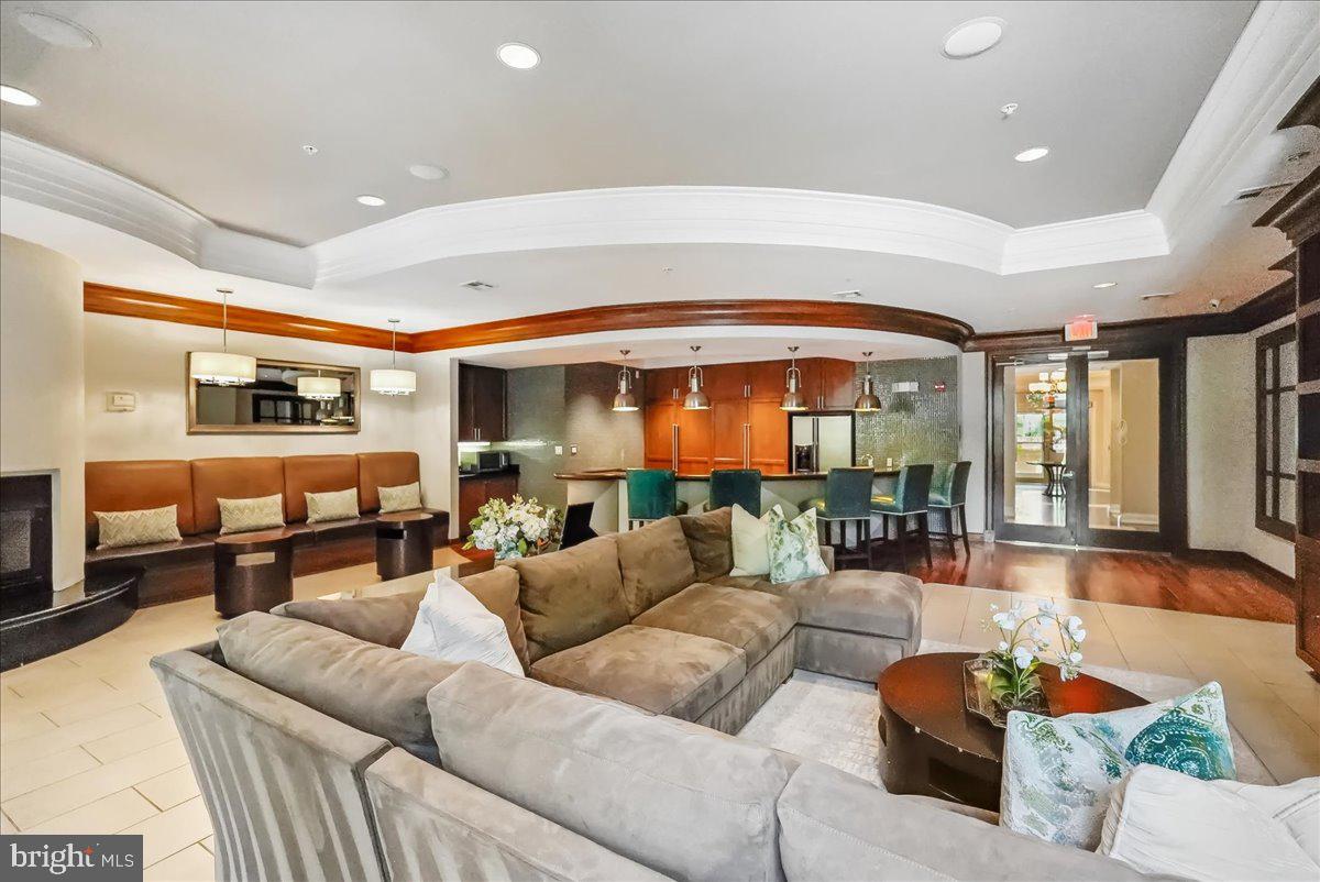 12000 Market Street, Unit 286 Reston, VA 20190 - Photo 17 of 39 Community living room
