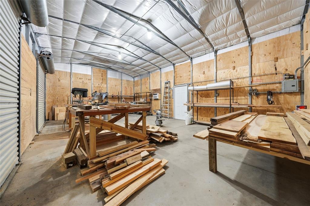 14433 Lake Yale Road Umatilla, FL 32784 - Photo 30 of 38 a view of a room with gym equipment