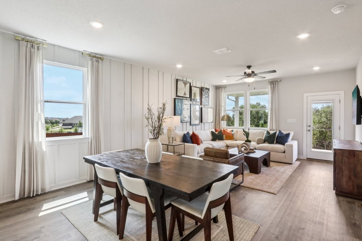 220 Bendecido Loop Elgin, TX 78621 - Photo 5 of 21 a living room with furniture potted plant and windows