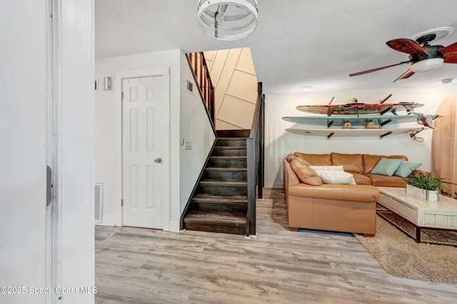 a view of livingroom with furniture and wooden floor