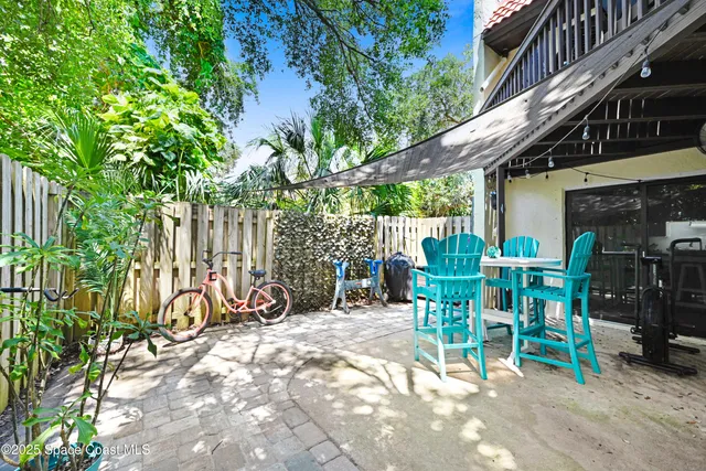 a view of outdoor dining space with a patio