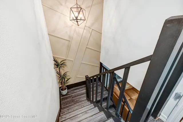 a view of entryway with wooden floor