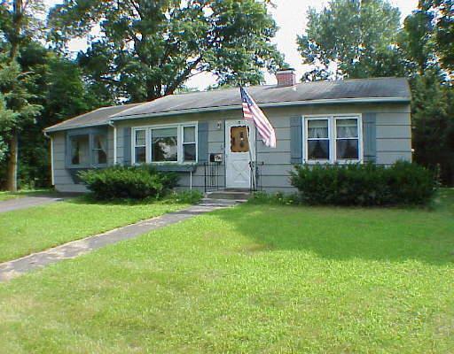165 Scout Road Southbury, CT 06488 - Photo 1 of 1 a view of a house with a yard and potted plants