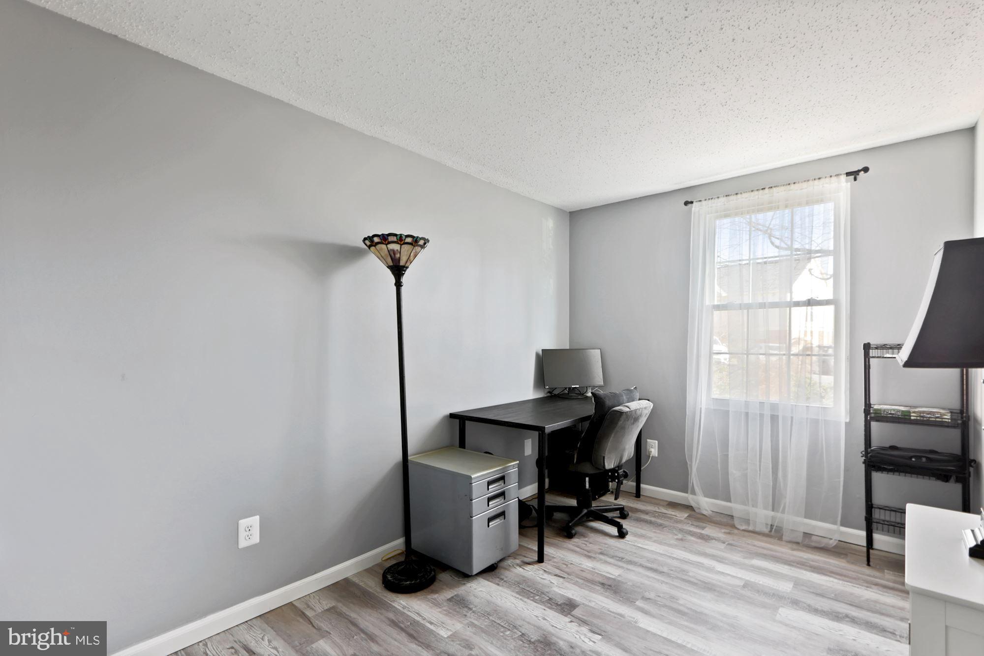 110 Fort Evans Road Southeast, Unit A Leesburg, VA 20175 - Photo 22 of 34 Second bedroom--new floors and paint