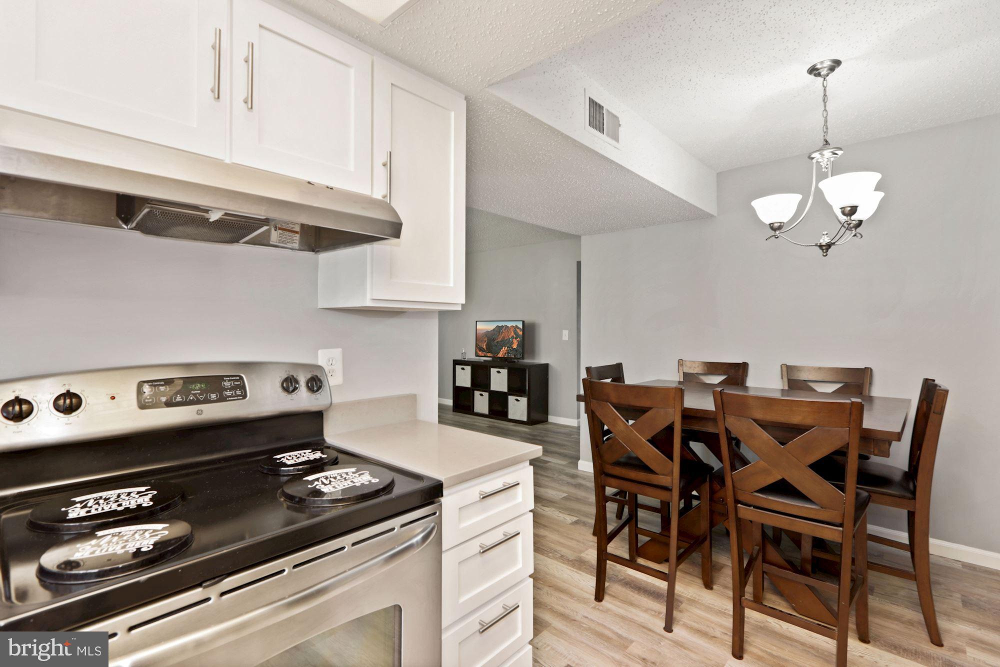110 Fort Evans Road Southeast, Unit A Leesburg, VA 20175 - Photo 6 of 34 Kitchenview to dining area