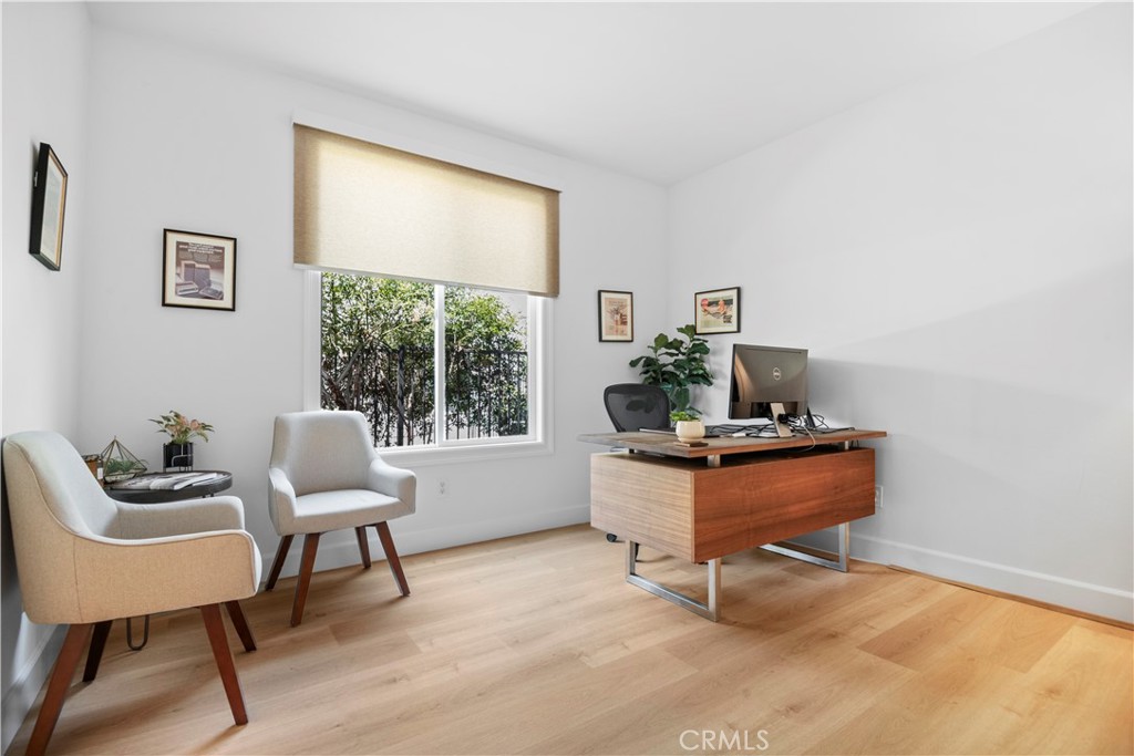 3966 Leighton Point Road Calabasas, CA 91301 - Photo 11 of 37 a living room with furniture and a window