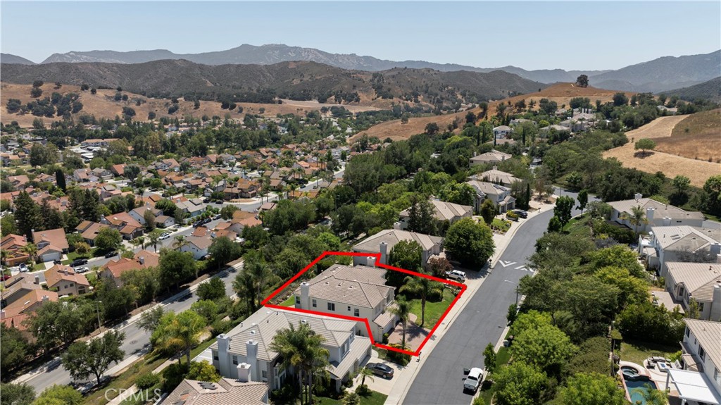 3966 Leighton Point Road Calabasas, CA 91301 - Photo 26 of 37 an aerial view of residential house with green space