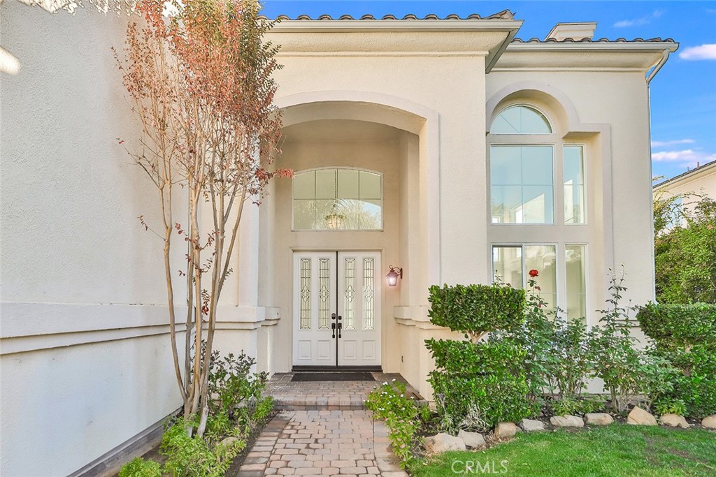 3966 Leighton Point Road Calabasas, CA 91301 - Photo 34 of 37 a front view of a house with garden