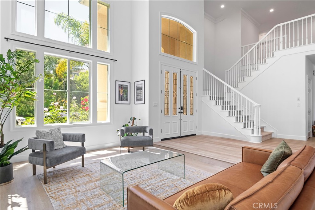 3966 Leighton Point Road Calabasas, CA 91301 - Photo 4 of 37 a living room with furniture and a large window