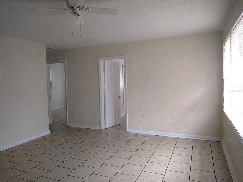 2008 Northwest 14th Street Ocala, FL 34475 - Photo 12 of 18 an empty room with windows