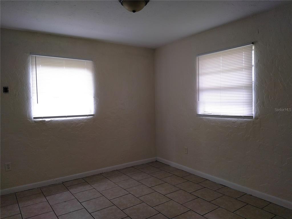 2008 Northwest 14th Street Ocala, FL 34475 - Photo 13 of 18 an empty room with a window