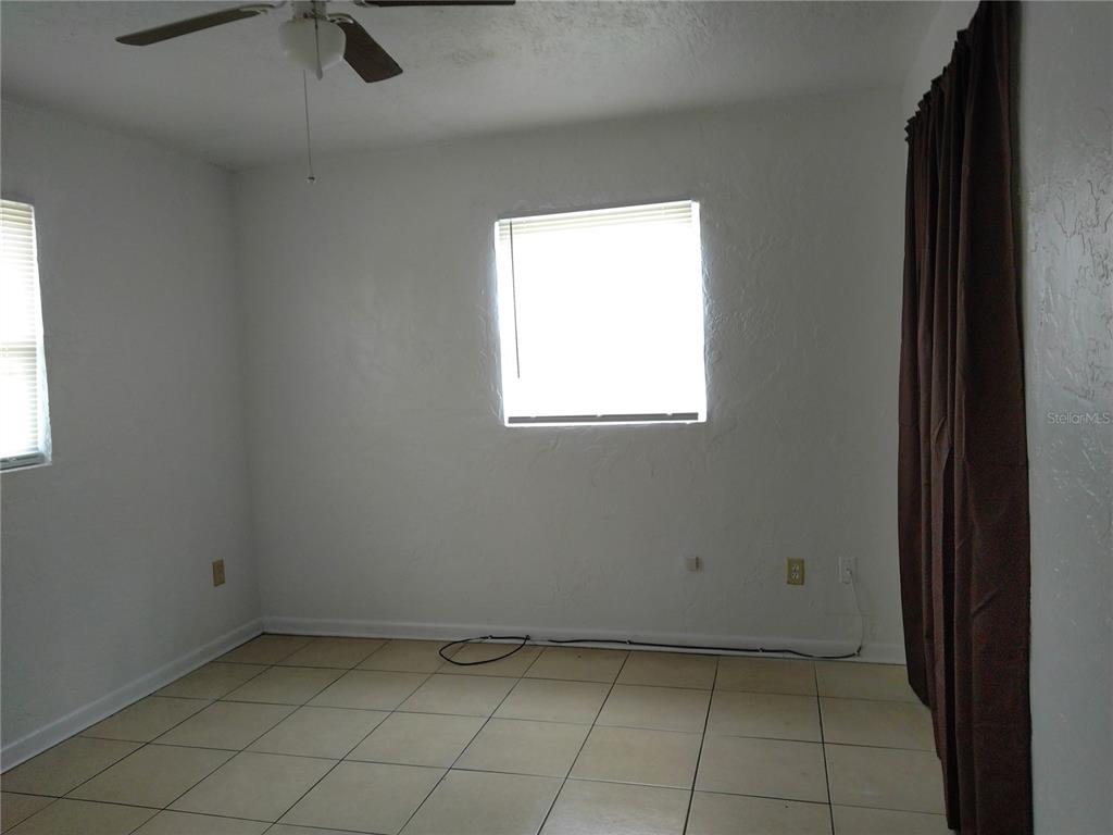 2008 Northwest 14th Street Ocala, FL 34475 - Photo 16 of 18 an empty room with windows