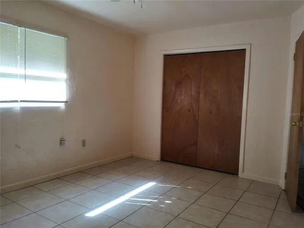 a kitchen with a sink stove and microwave