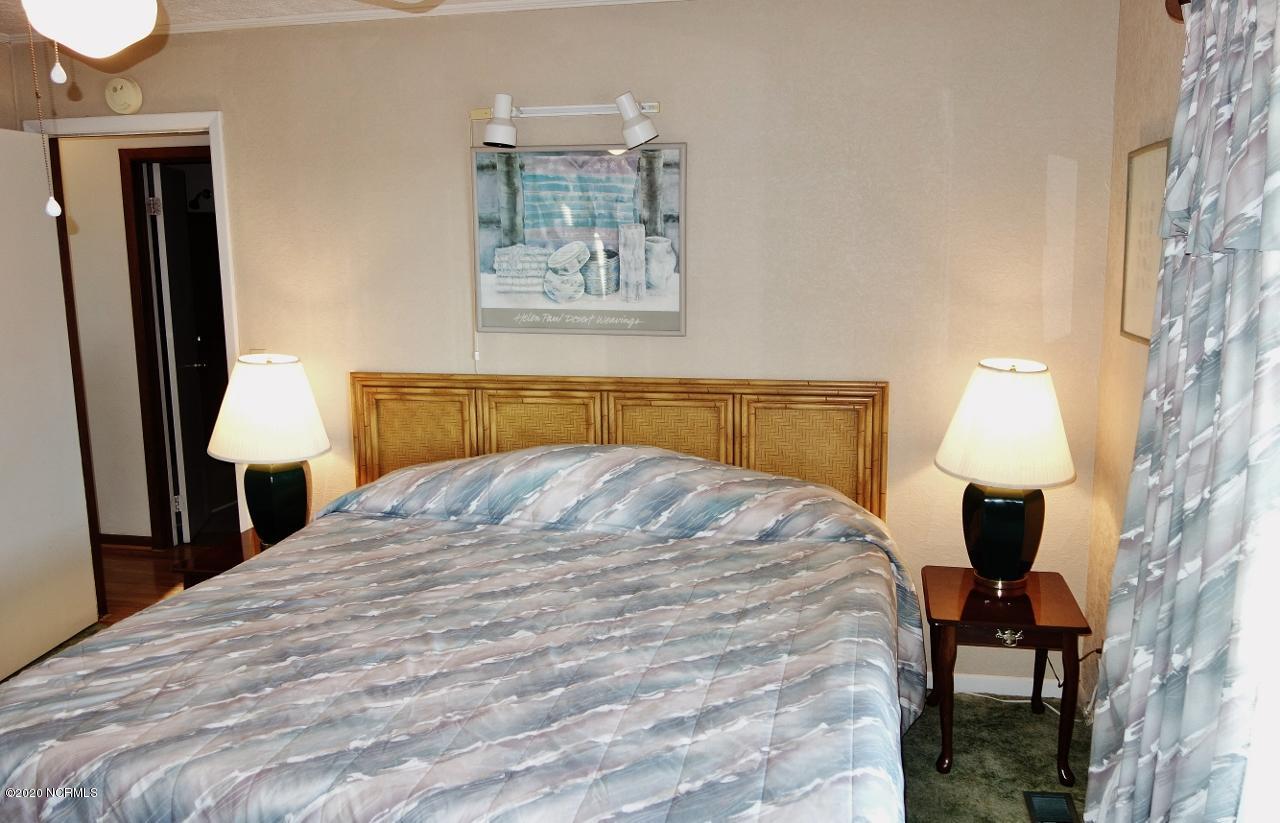 1409 Inlet Street Sunset Beach, NC 28468 - Photo 19 of 43 Master Bedroom