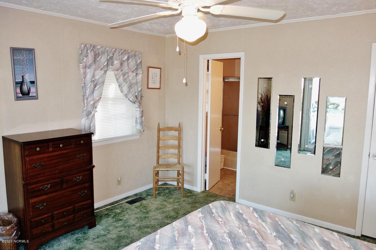 1409 Inlet Street Sunset Beach, NC 28468 - Photo 20 of 43 Master Bedroom