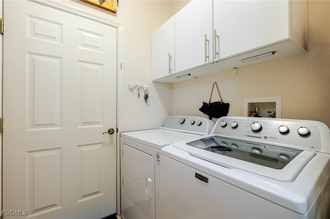 3610 Rue Alec Loop, Unit 1 North Fort Myers, FL 33917 - Photo 27 of 39 a utility room with dryer and washer