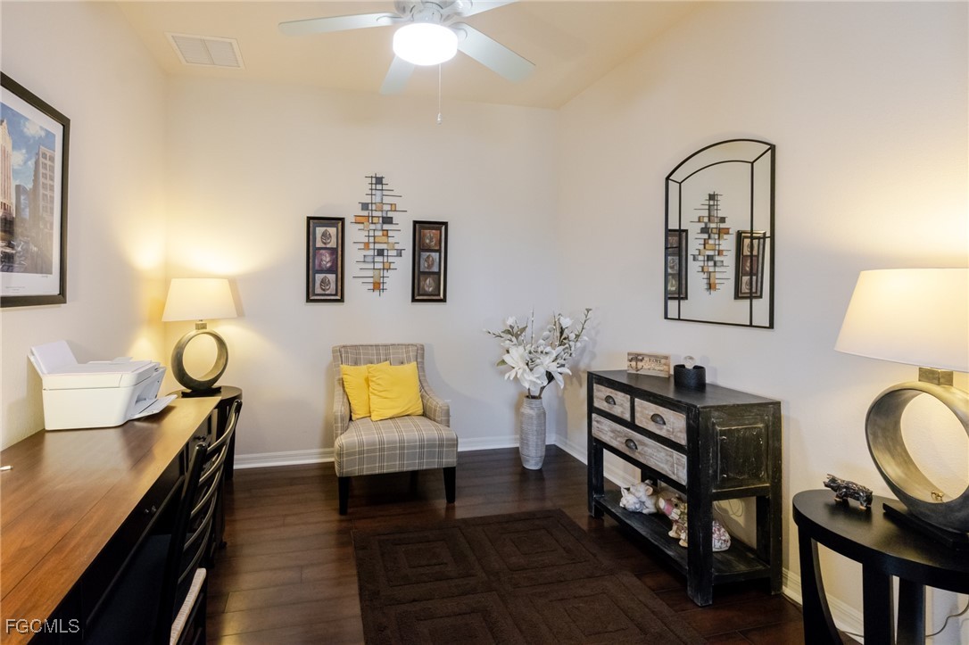 3610 Rue Alec Loop, Unit 1 North Fort Myers, FL 33917 - Photo 8 of 39 a living room with furniture and wooden floor