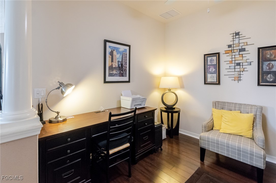 3610 Rue Alec Loop, Unit 1 North Fort Myers, FL 33917 - Photo 9 of 39 a living room with furniture and wooden floor