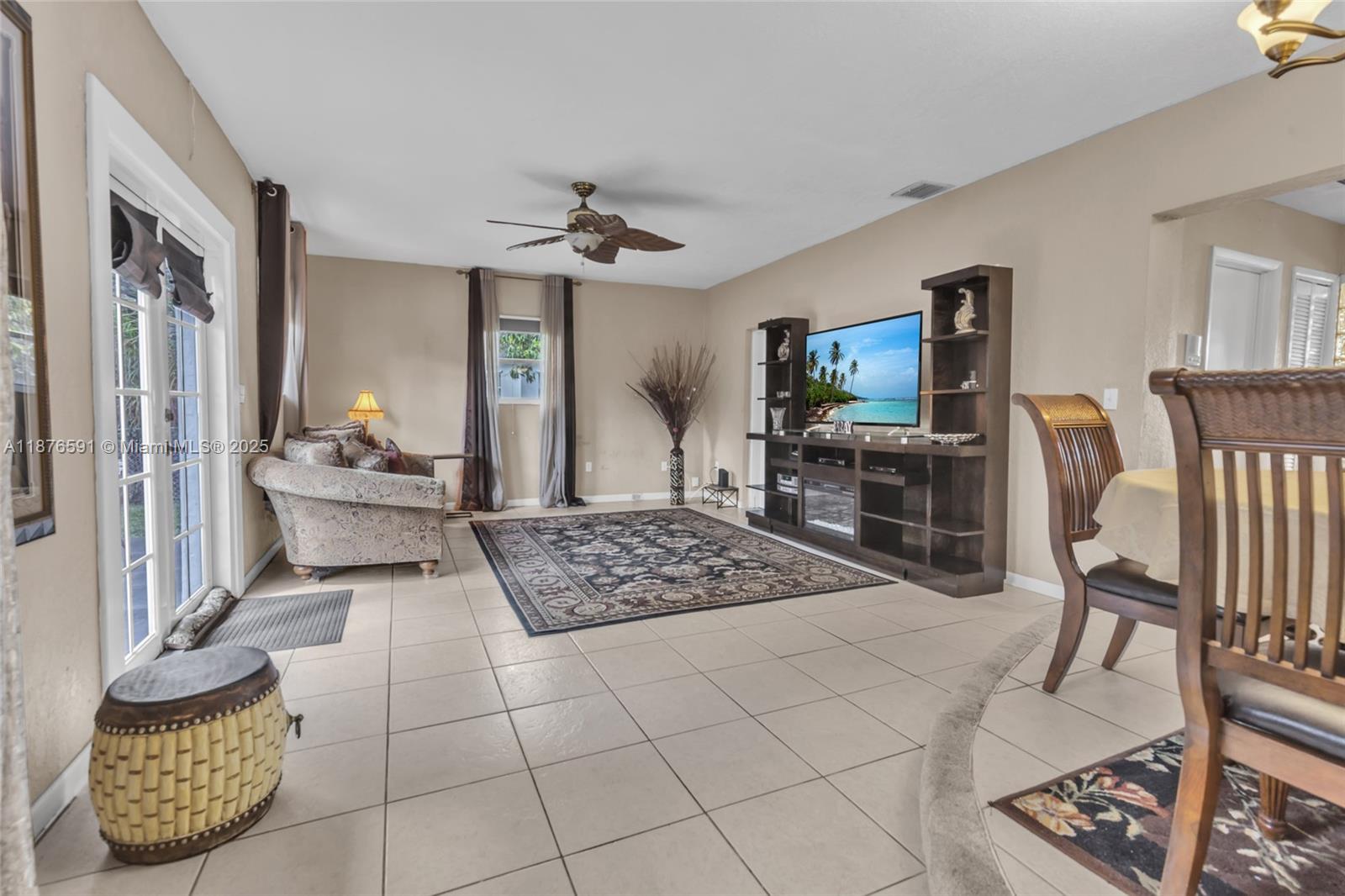 22270 Southwest 109th Avenue Miami, FL 33176 - Photo 17 of 48 a bedroom with furniture and wooden floor