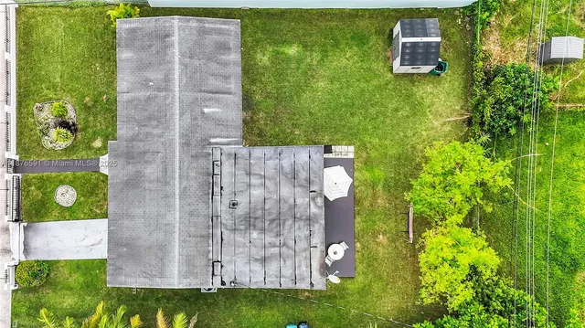 a house view with a garden space