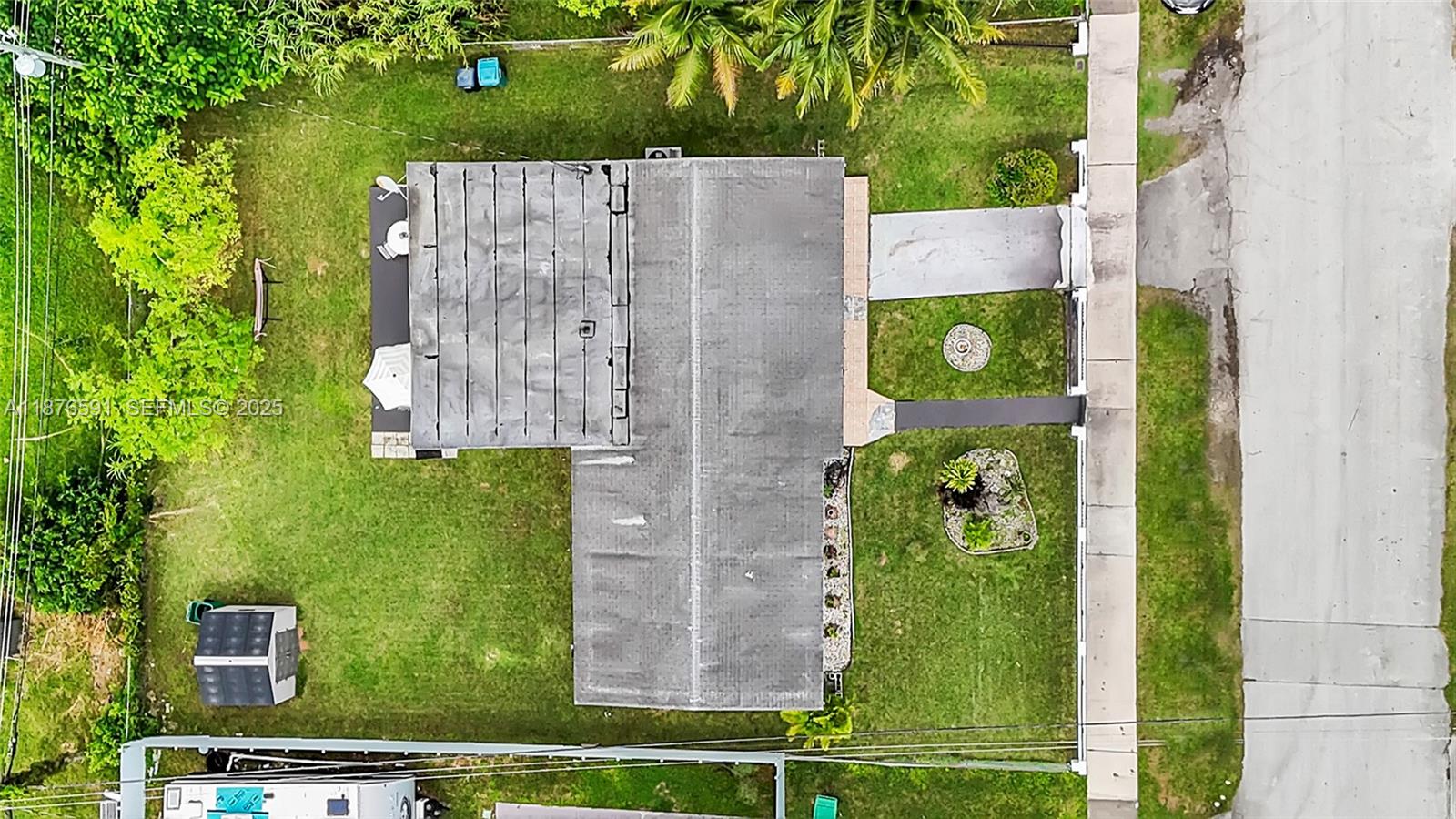 22270 Southwest 109th Avenue Miami, FL 33176 - Photo 35 of 48 a view of an entryway with a yard