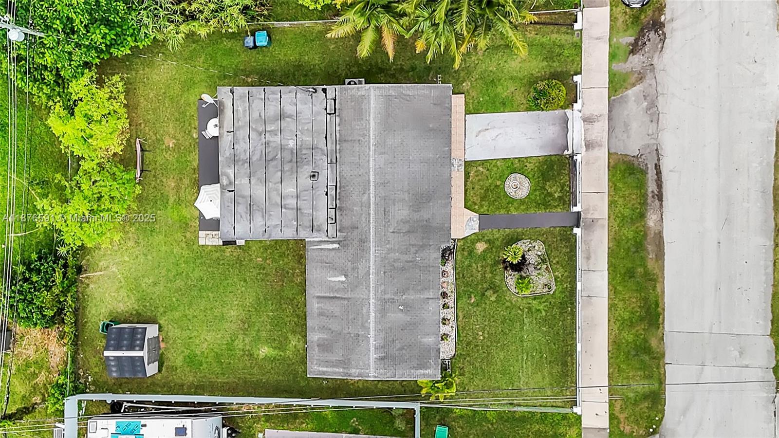 22270 Southwest 109th Avenue Miami, FL 33176 - Photo 35 of 48 a view of an entryway with a yard