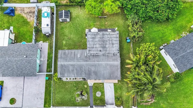 an aerial view of a house with garden