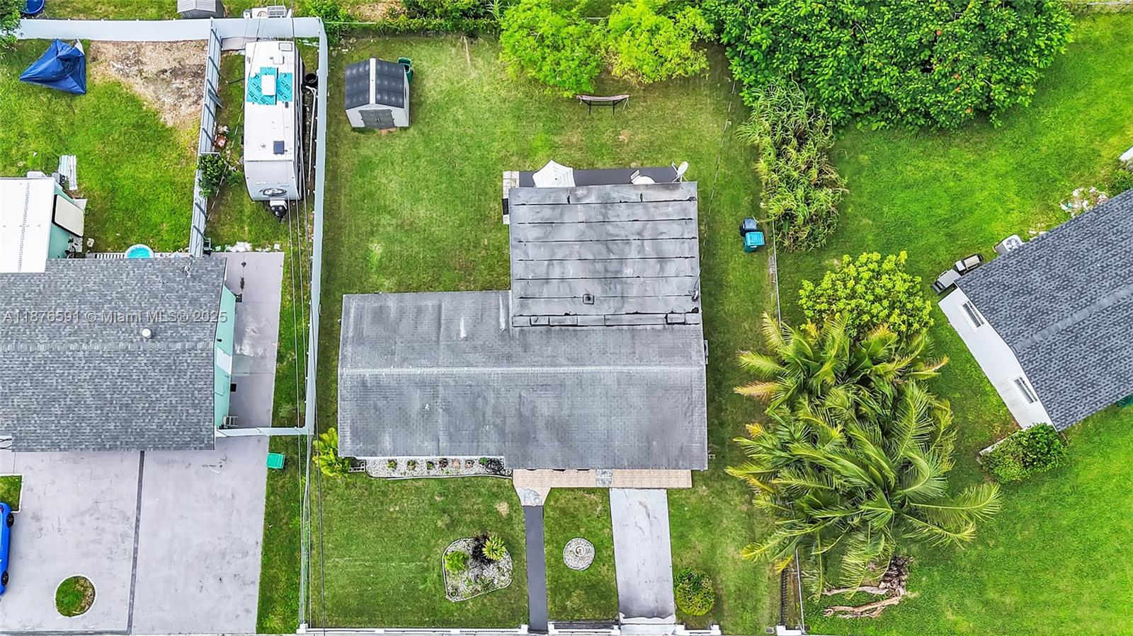 22270 Southwest 109th Avenue Miami, FL 33176 - Photo 36 of 48 an aerial view of a house having yard