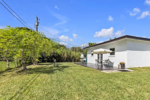 a house view with a garden space