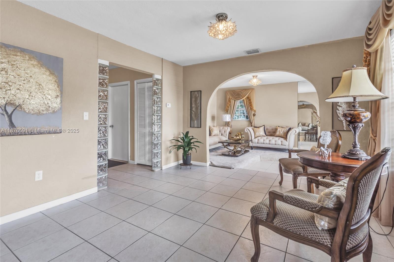 22270 Southwest 109th Avenue Miami, FL 33176 - Photo 10 of 48 a living room with furniture
