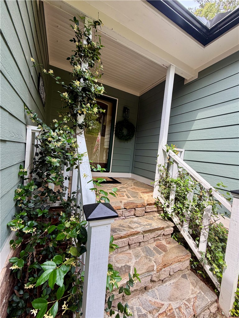 232 Hunters Trail Walhalla, SC 29691 - Photo 3 of 38 Enter this charming home via a stone pathway leading to a welcoming front porch.