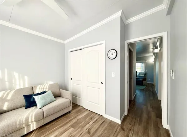 a bedroom with a bed and a view of bathroom