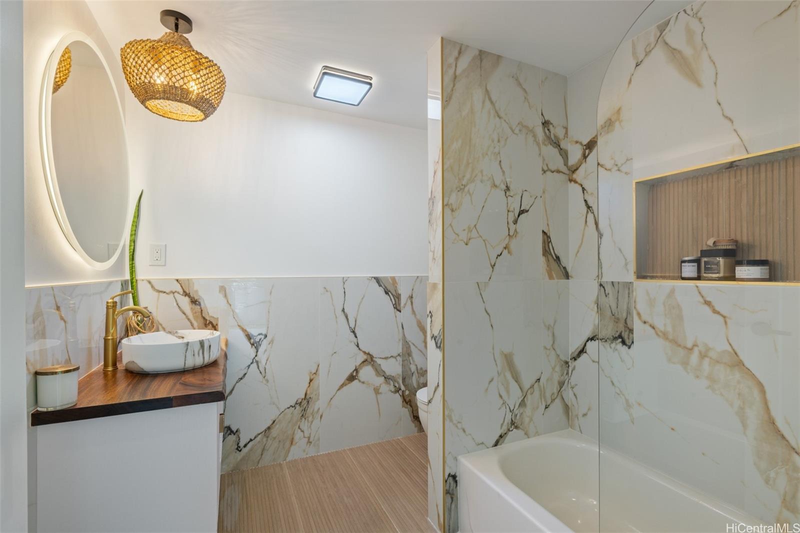 852 Kainoa Place Honolulu, HI 96821 - Photo 18 of 25 a bathroom with a sink and a mirror