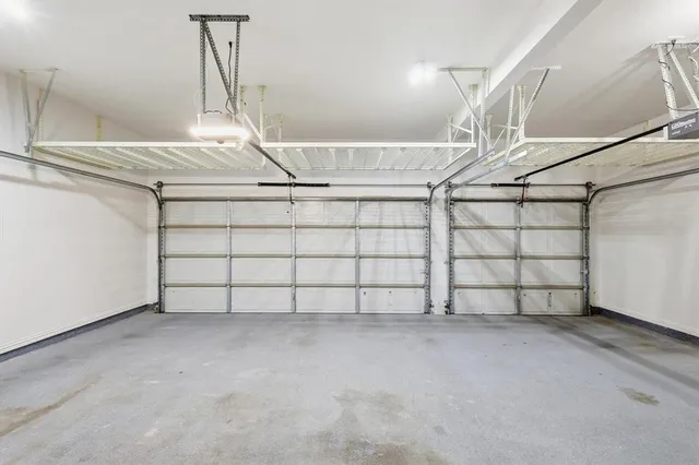 a house with swimming pool in front of it