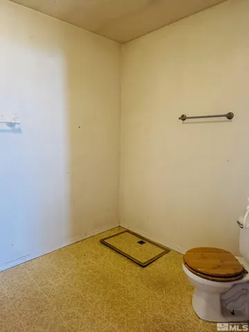 a bathroom with a toilet