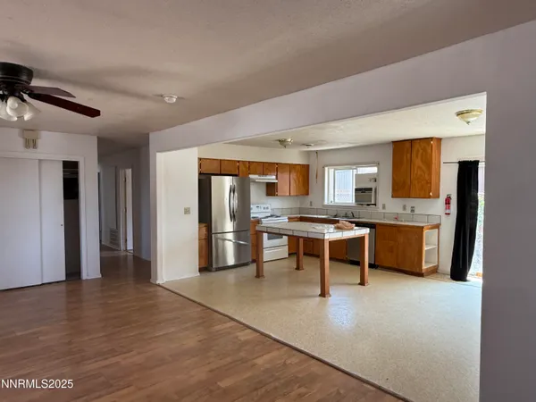 a view of kitchen with counter top space and appliances