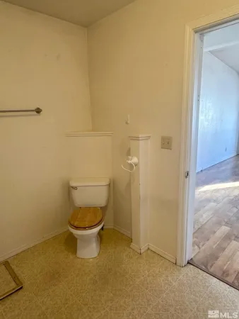 a bathroom with a toilet