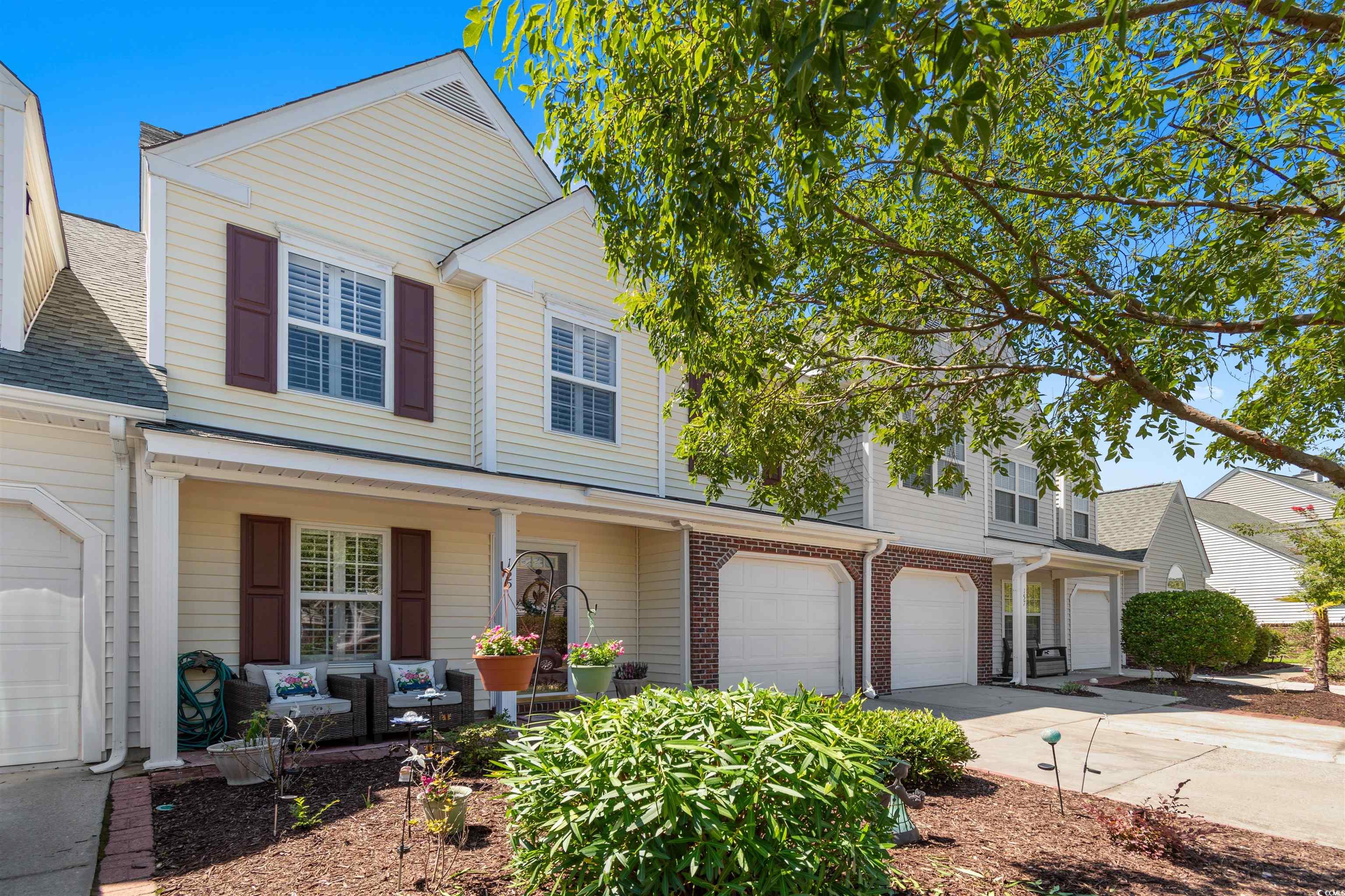 155 Wimbledon Way, Unit 155 Murrells Inlet, SC 29576 - Photo 1 of 32 View of front facade featuring a garage