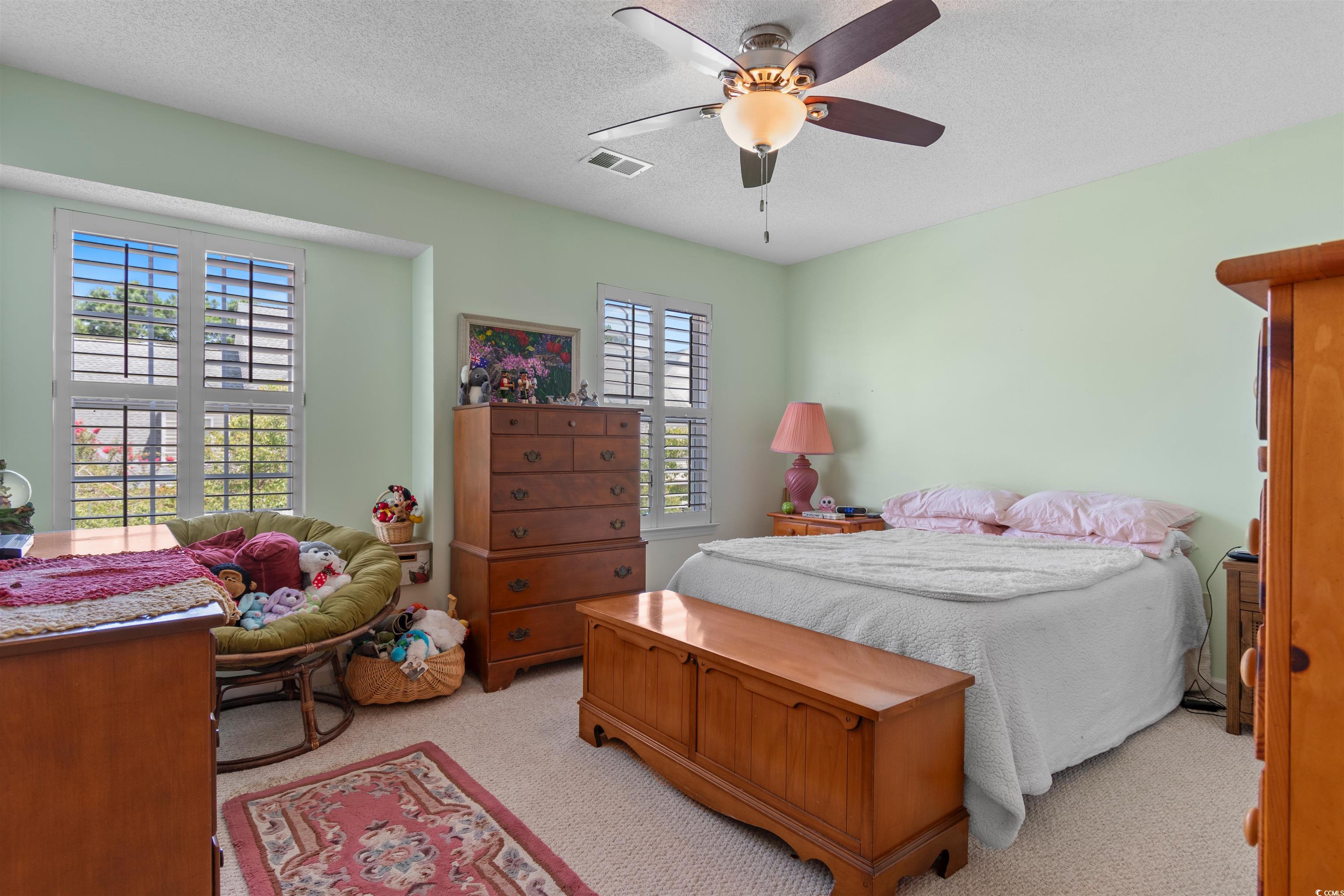 155 Wimbledon Way, Unit 155 Murrells Inlet, SC 29576 - Photo 16 of 32 Sunroom / solarium featuring a water view and ceil