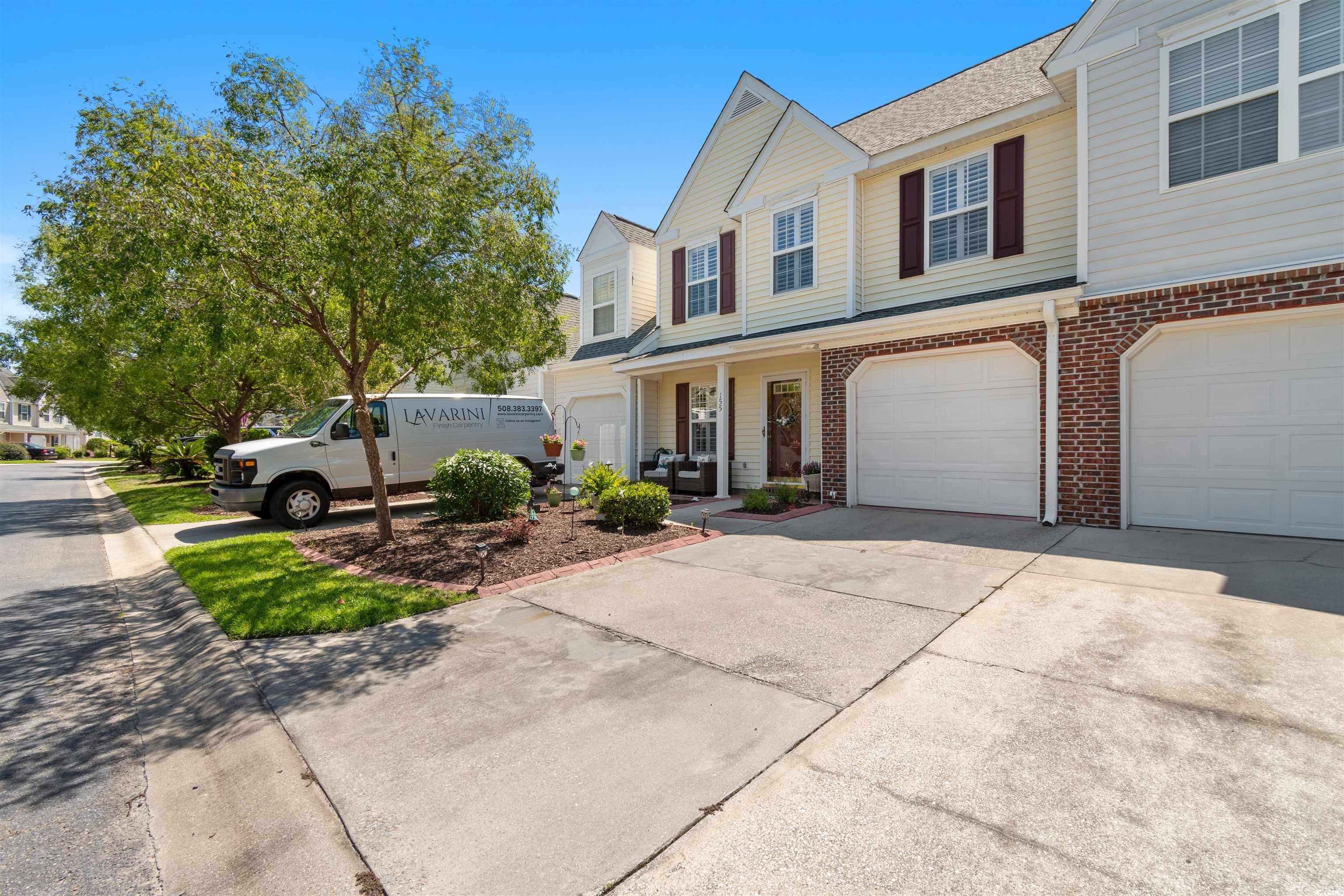 155 Wimbledon Way, Unit 155 Murrells Inlet, SC 29576 - Photo 2 of 32 View of front of property with a garage