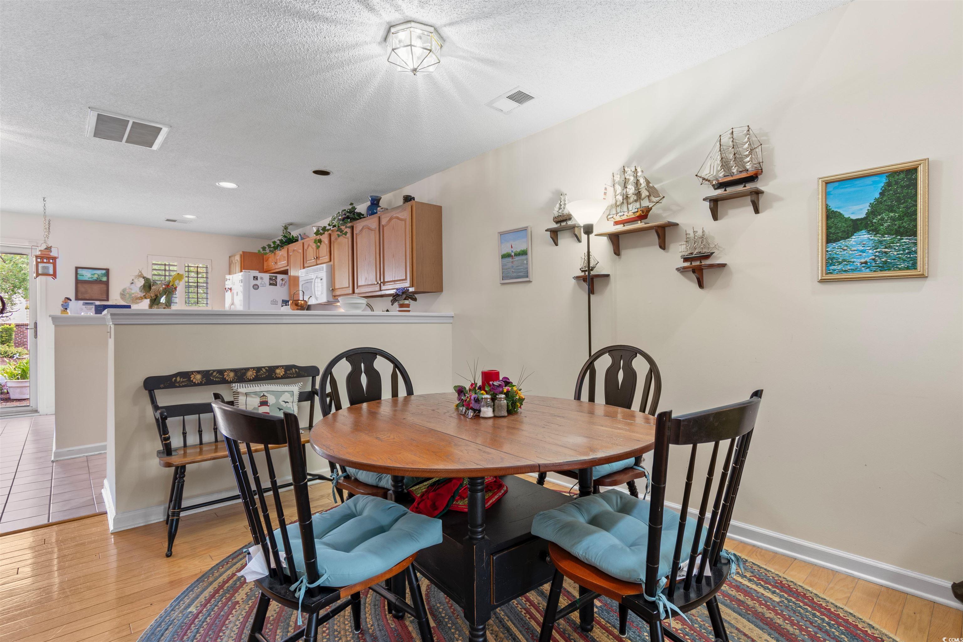 155 Wimbledon Way, Unit 155 Murrells Inlet, SC 29576 - Photo 8 of 32 Kitchen with light tile patterned floors, dishwash