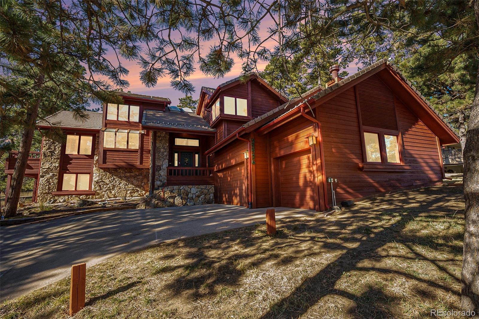 23526 Currant Drive Golden, CO 80401 - Photo 2 of 30 a front view of a house